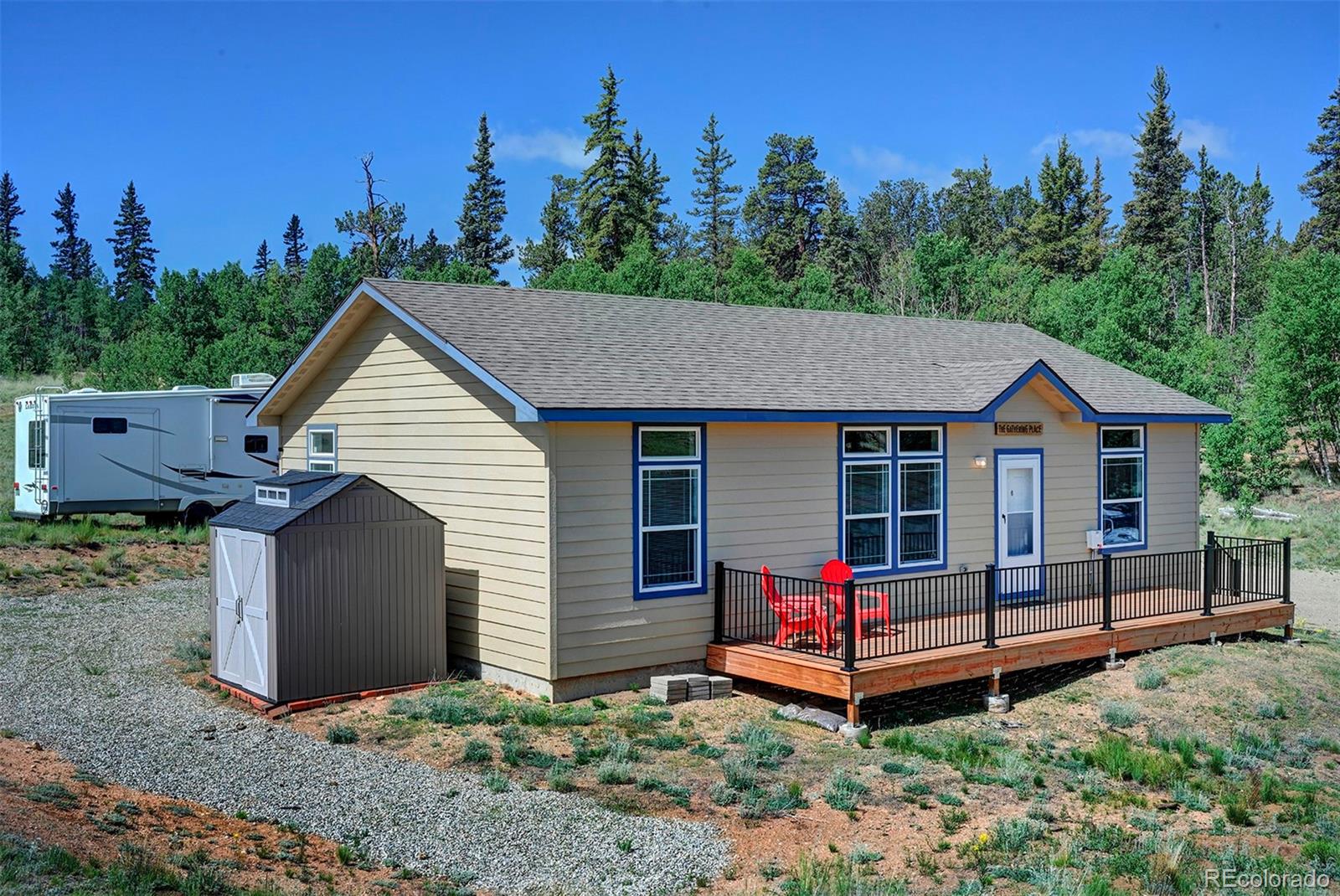 142 Long Rifle Way Como, CO 80432 - Photo 20 of 24 a view of a house with a yard and wooden fence