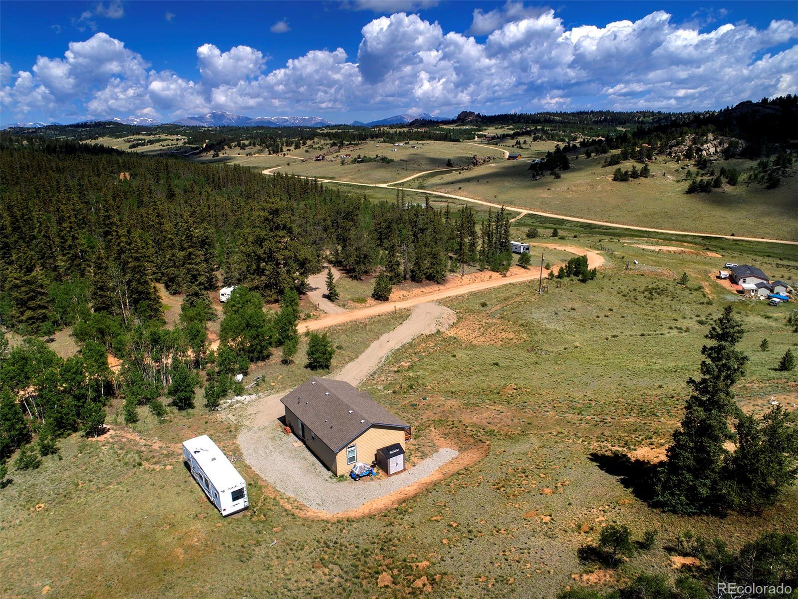 142 Long Rifle Way Como, CO 80432 - Photo 24 of 24 a view of a lake from a balcony