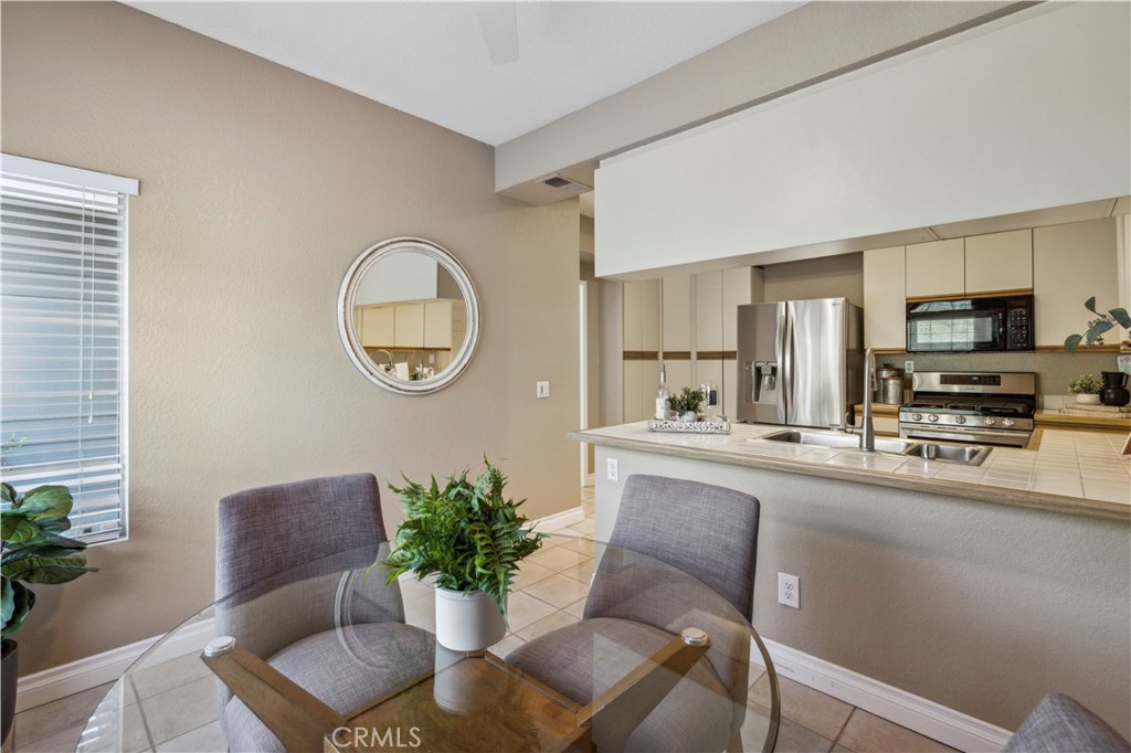 1 Suffolk Downs Laguna Niguel, CA 92677 - Photo 17 of 33 a dining room with furniture and a potted plant