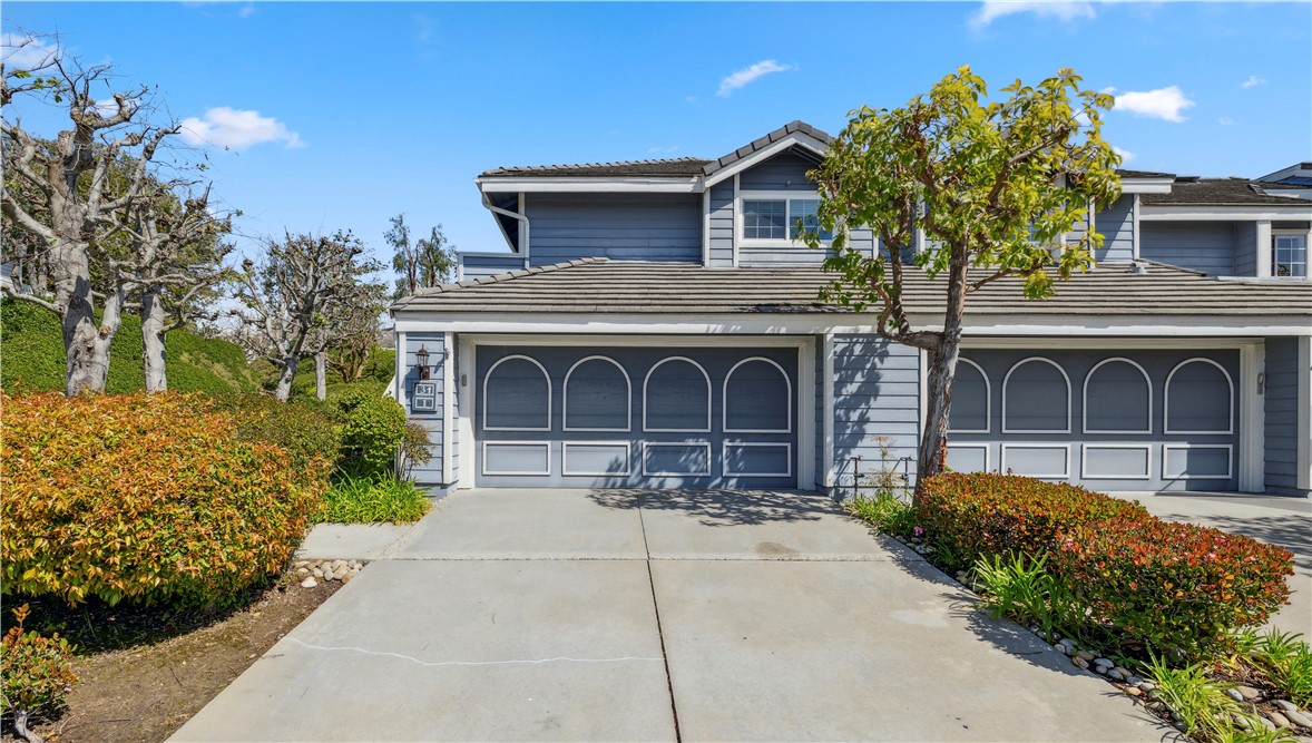 1 Suffolk Downs Laguna Niguel, CA 92677 - Photo 2 of 33 a front view of a house with garden