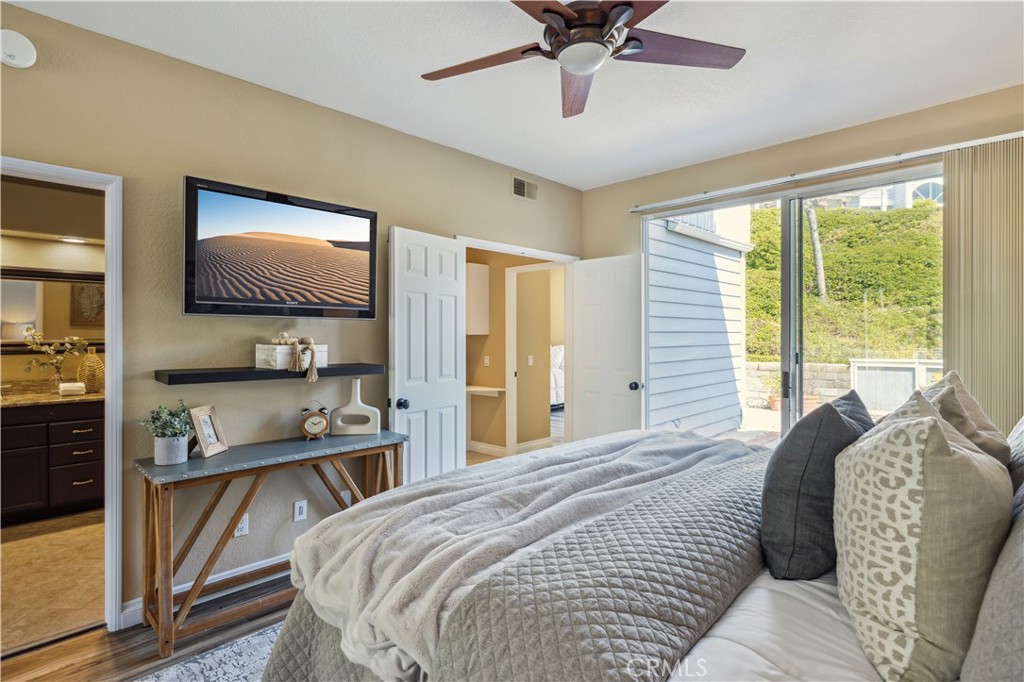 1 Suffolk Downs Laguna Niguel, CA 92677 - Photo 22 of 33 a bedroom with a bed tv and a window