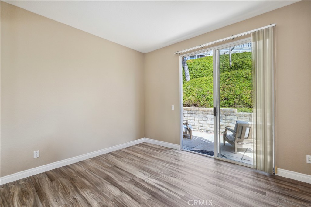 1 Suffolk Downs Laguna Niguel, CA 92677 - Photo 23 of 33 a view of an empty room with wooden floor and a window
