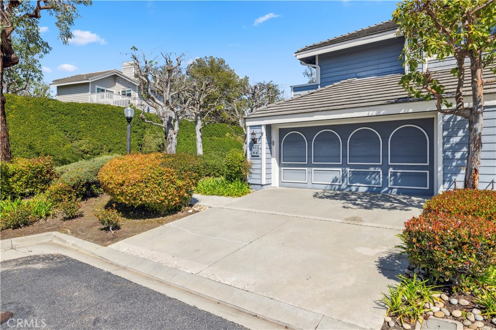 1 Suffolk Downs Laguna Niguel, CA 92677 - Photo 28 of 33 a front view of a house with yard and garage