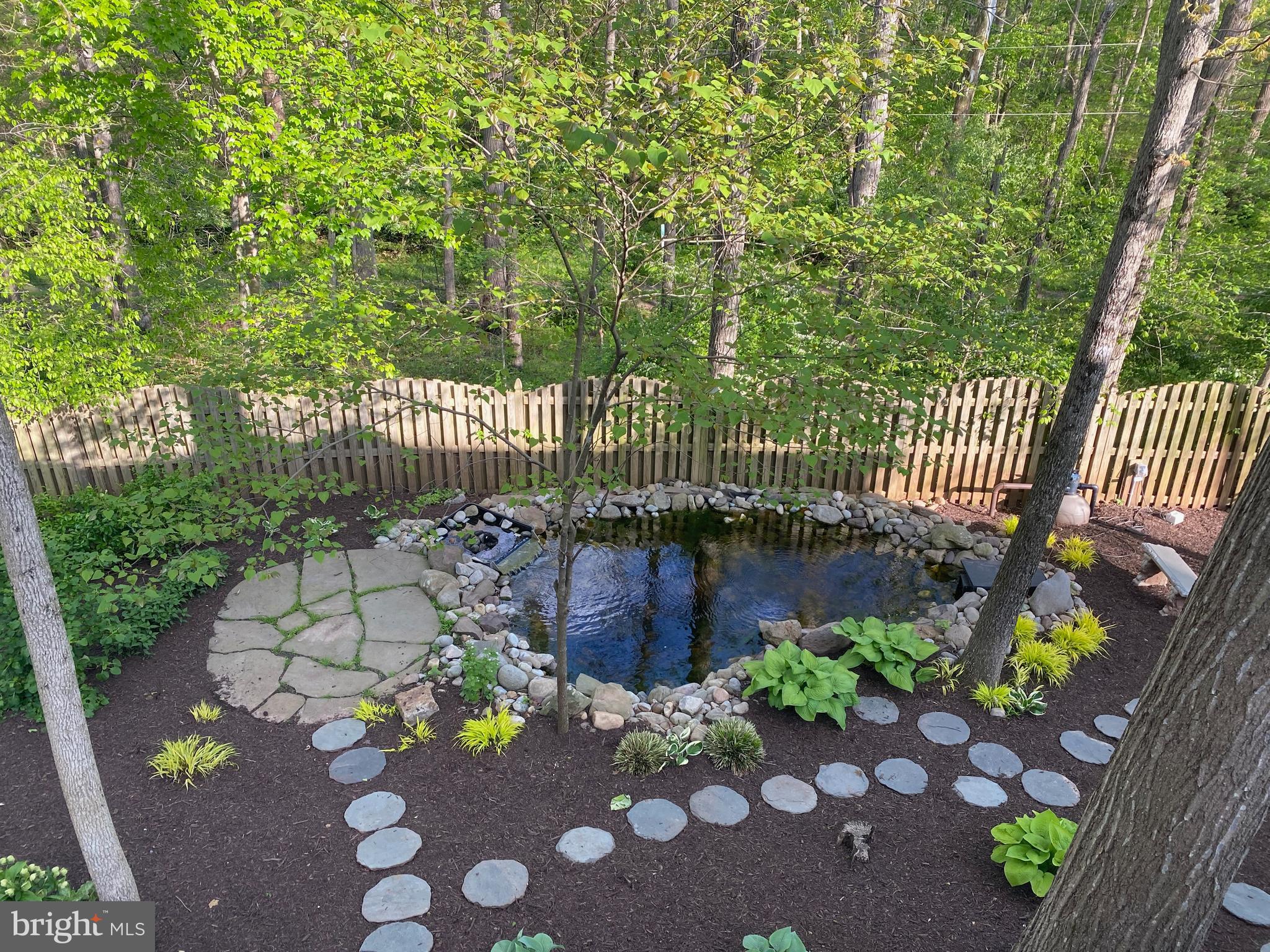 835 Potomac Ridge Court Sterling, VA 20164 - Photo 77 of 93 The Beautiful Pond with Fountain for your own Koi