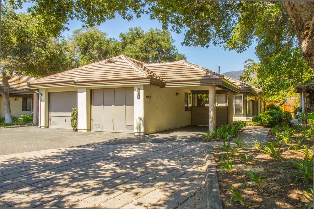 4042 Primavera Road, Unit 12 Santa Barbara, CA 93110 - Photo 1 of 21 a front view of a house with a garden