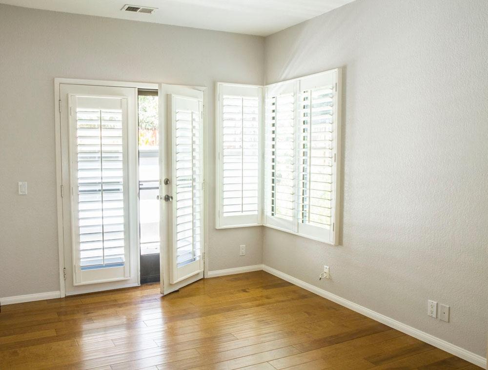 4042 Primavera Road, Unit 12 Santa Barbara, CA 93110 - Photo 11 of 21 a view of an empty room with wooden floor and a window