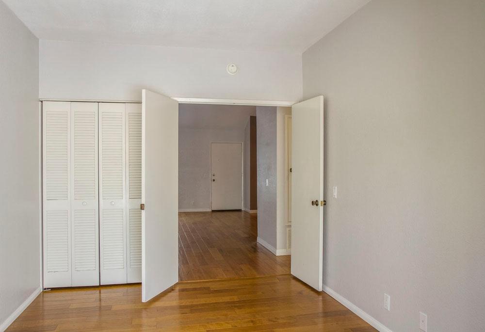 4042 Primavera Road, Unit 12 Santa Barbara, CA 93110 - Photo 13 of 21 a view of a hallway with wooden floor