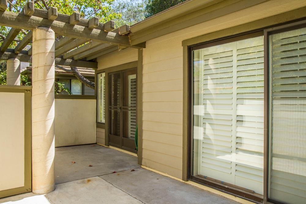 4042 Primavera Road, Unit 12 Santa Barbara, CA 93110 - Photo 20 of 21 a view of a porch with a door and a door