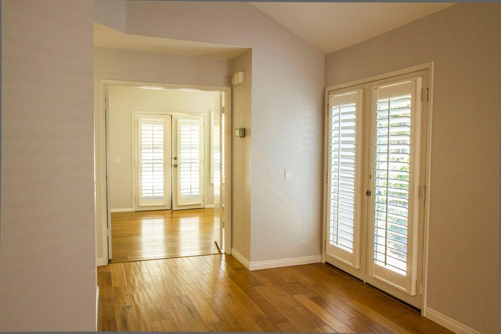 4042 Primavera Road, Unit 12 Santa Barbara, CA 93110 - Photo 10 of 21 a view of wooden floor and windows in a room