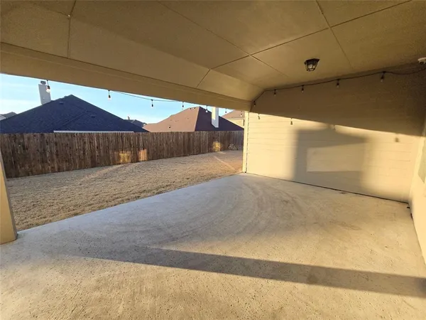 a view of large parking space and a window