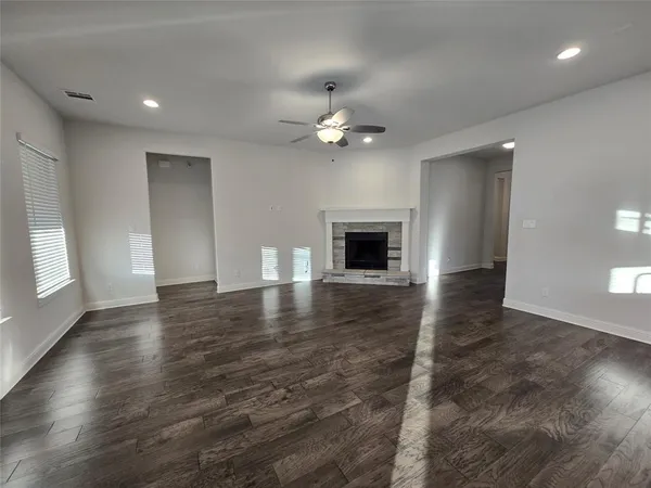 a kitchen with kitchen island a sink stainless steel appliances and cabinets