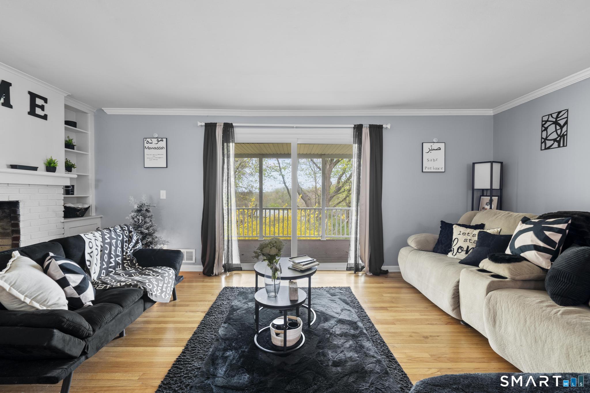 35 Fans Rock Road Hamden, CT 06518 - Photo 12 of 23 a living room with furniture and a large window
