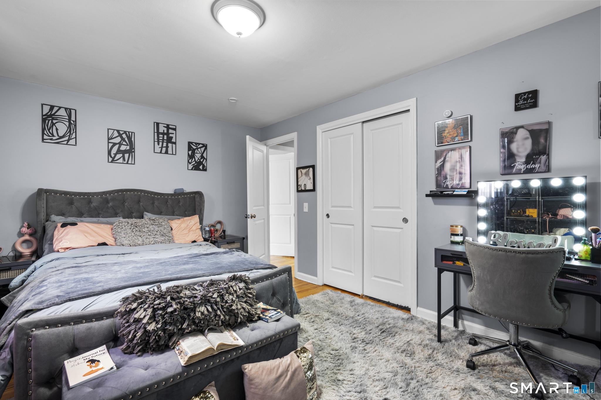35 Fans Rock Road Hamden, CT 06518 - Photo 18 of 23 a bedroom with a bed and a desk
