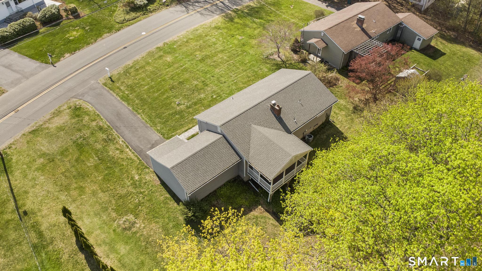 35 Fans Rock Road Hamden, CT 06518 - Photo 5 of 23 an aerial view of a house with swimming pool