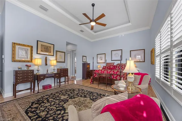 a bathroom with a granite countertop sink toilet a mirror a vanity and shower