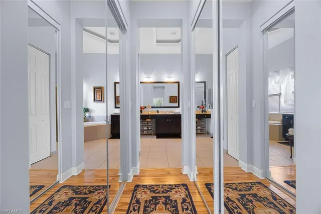 a bathroom with a tub and shower