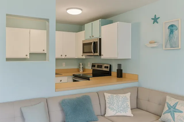 a view of a kitchen with washer and dryer
