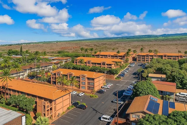a view of a city with an ocean