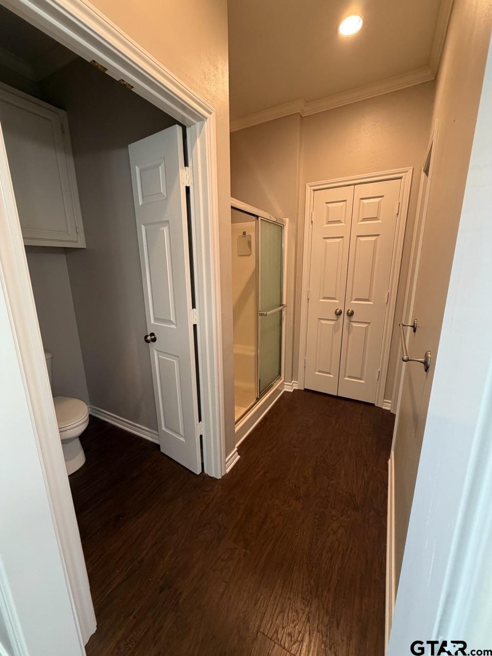 3204 Pebblebrook Circle Tyler, TX 75707 - Photo 13 of 18 an empty room with wooden floor and entrance