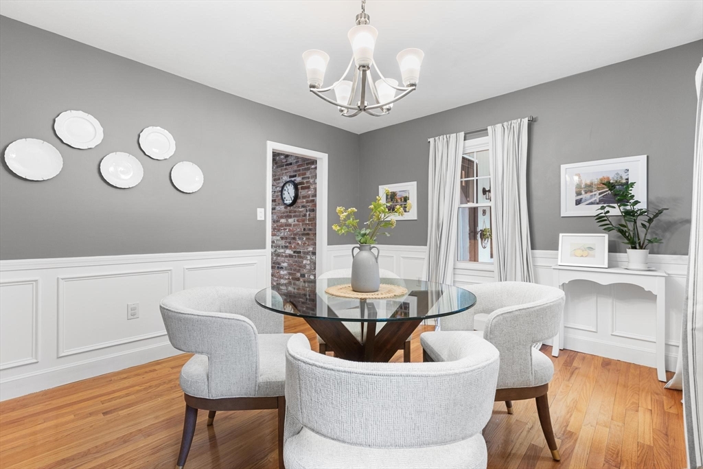 89 Haggetts Pond Road Andover, MA 01810 - Photo 13 of 42 a living room with furniture and a large window