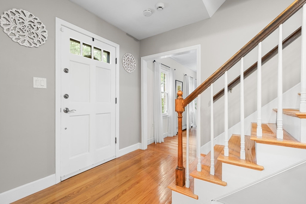 89 Haggetts Pond Road Andover, MA 01810 - Photo 4 of 42 a view of an entryway with wooden floor