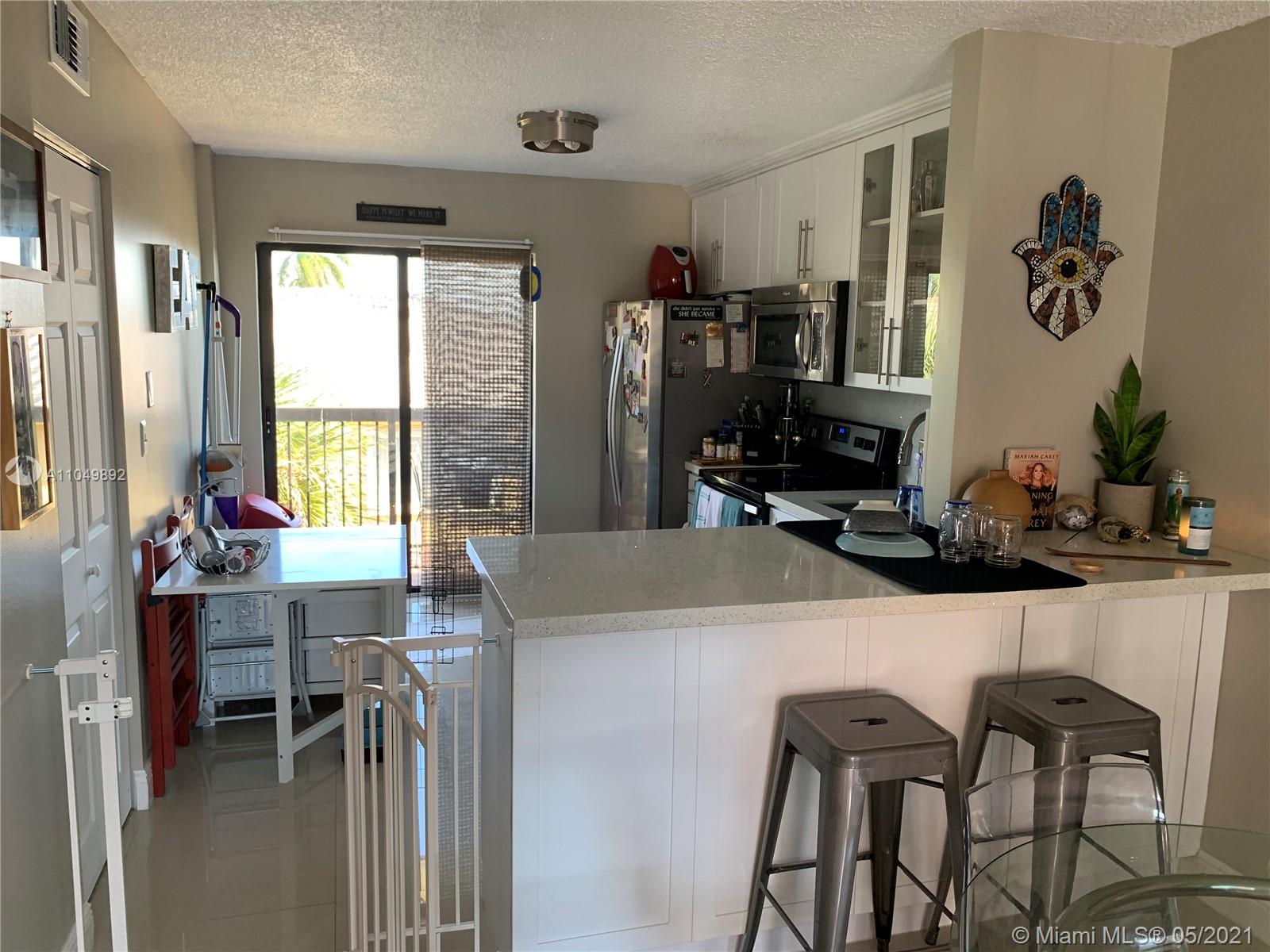 5290 West 21st Court, Unit 307 Hialeah, FL 33016 - Photo 2 of 18