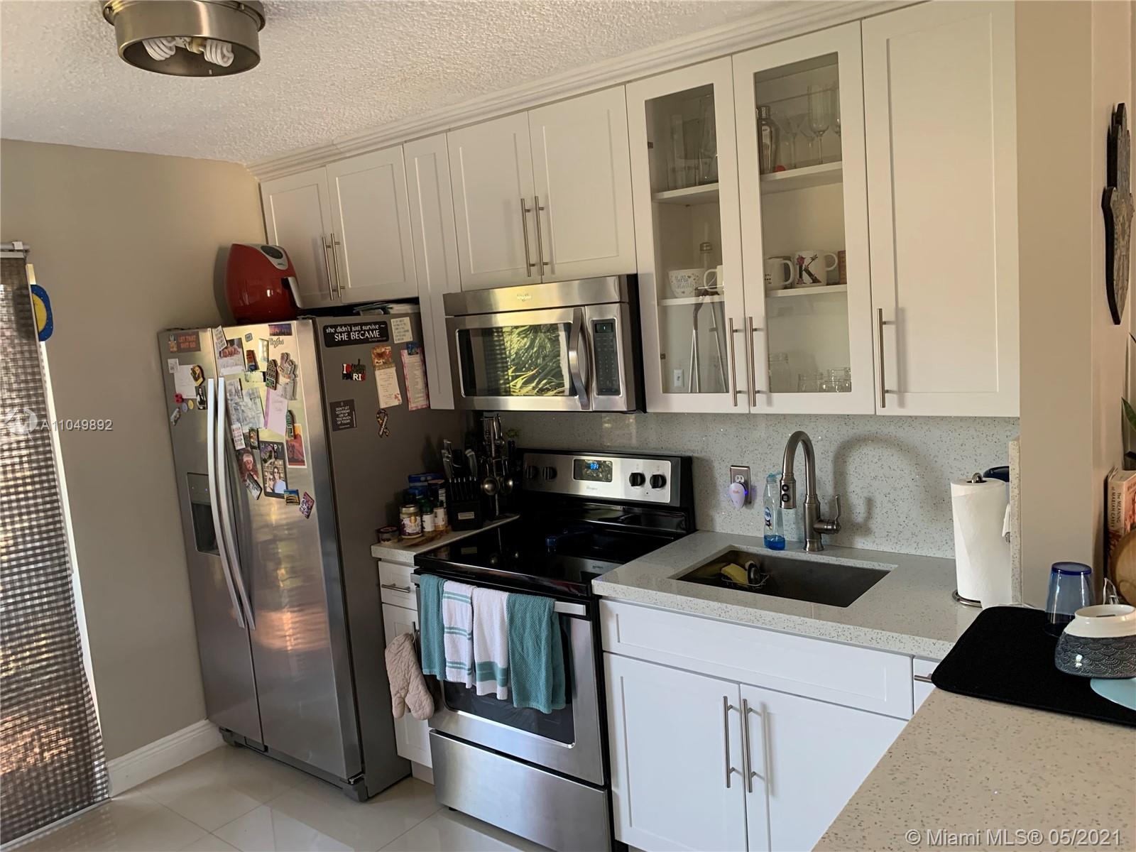 5290 West 21st Court, Unit 307 Hialeah, FL 33016 - Photo 3 of 18