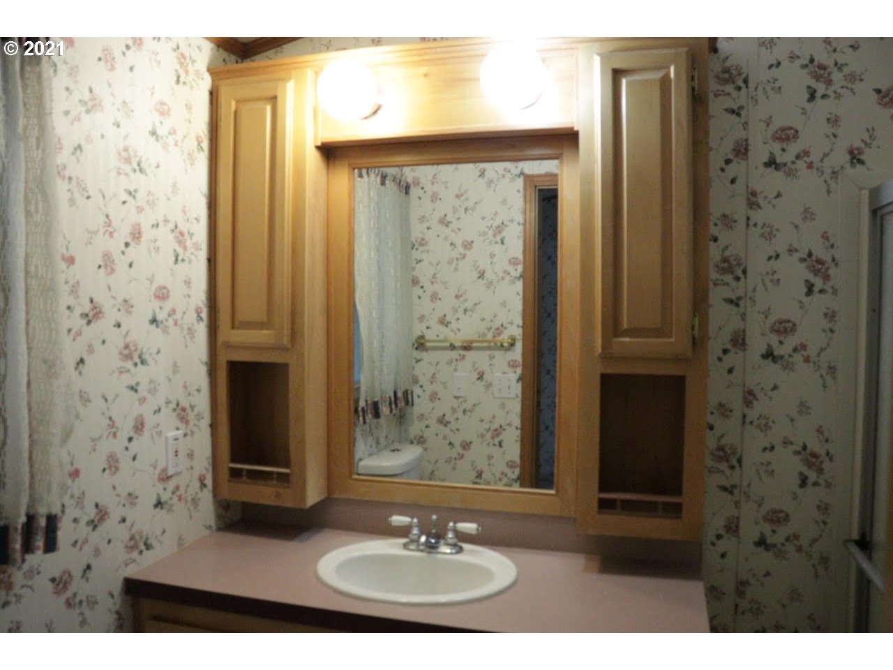 2150 Laura Street, Unit 221 Springfield, OR 97477 - Photo 15 of 16 a bathroom with a shower and a sink