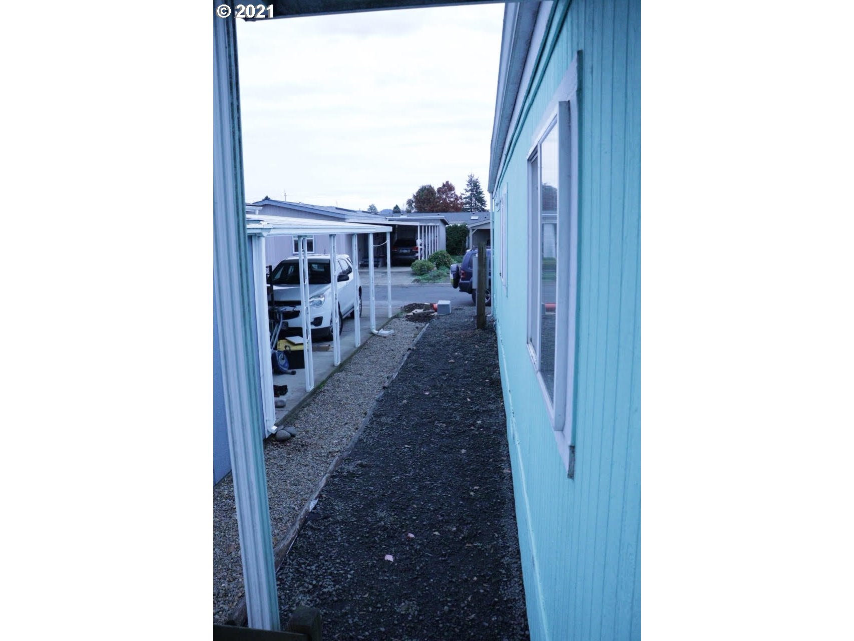2150 Laura Street, Unit 221 Springfield, OR 97477 - Photo 3 of 16 a view of a porch