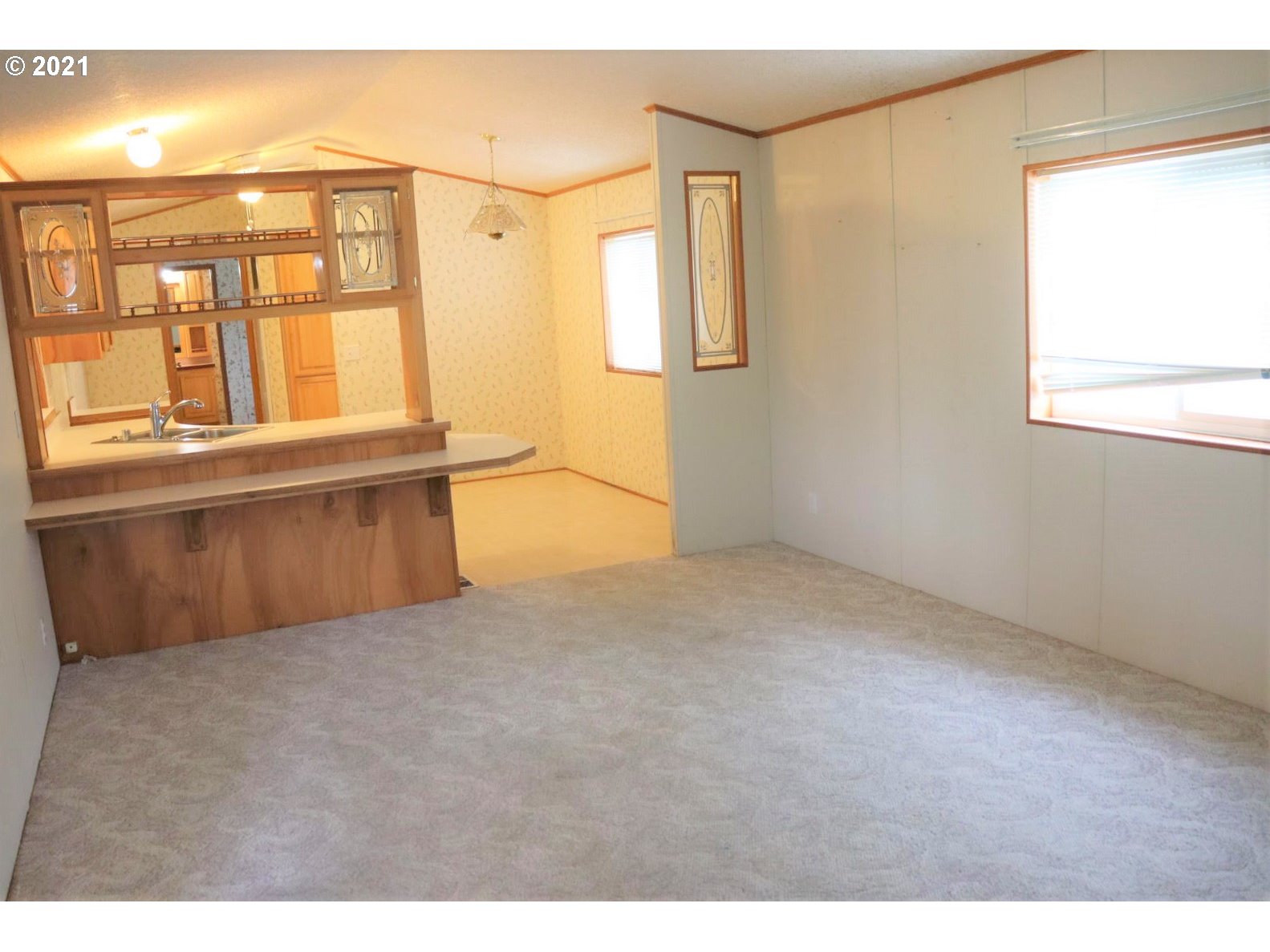 2150 Laura Street, Unit 221 Springfield, OR 97477 - Photo 5 of 16 a view of an empty room with a window