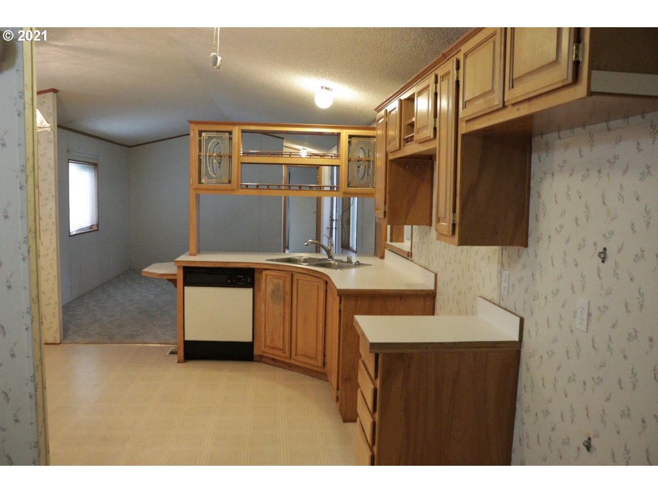 2150 Laura Street, Unit 221 Springfield, OR 97477 - Photo 8 of 16 a bathroom with a sink double vanity and a mirror