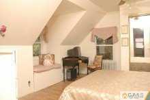 164 Jordan Road Colonia, NJ 07067 - Photo 5 of 8 a bedroom with furniture and a potted plant