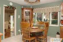 164 Jordan Road Colonia, NJ 07067 - Photo 7 of 8 a view of a dining room with furniture and chandelier