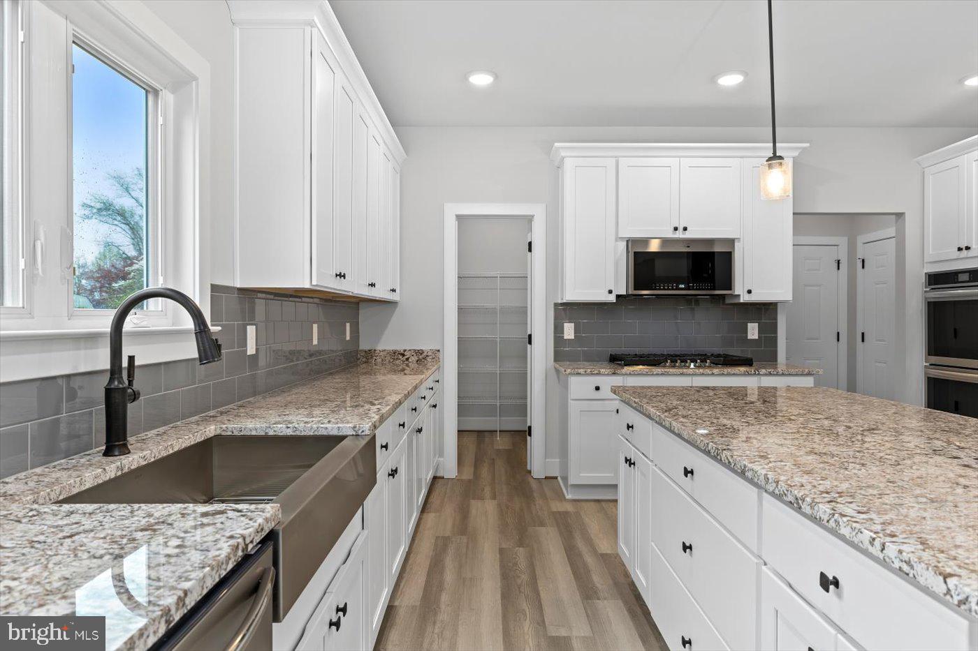 0 Stevensburg Road Culpeper, VA 22701 - Photo 16 of 42 a kitchen with stainless steel appliances granite countertop a sink stove and refrigerator