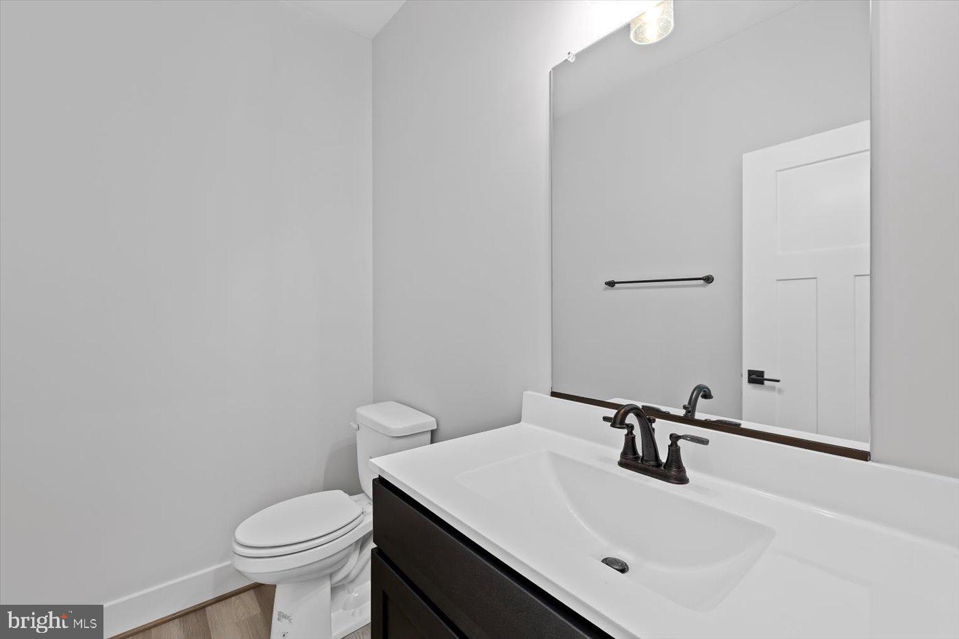 0 Stevensburg Road Culpeper, VA 22701 - Photo 19 of 42 a bathroom with a sink a toilet and mirror