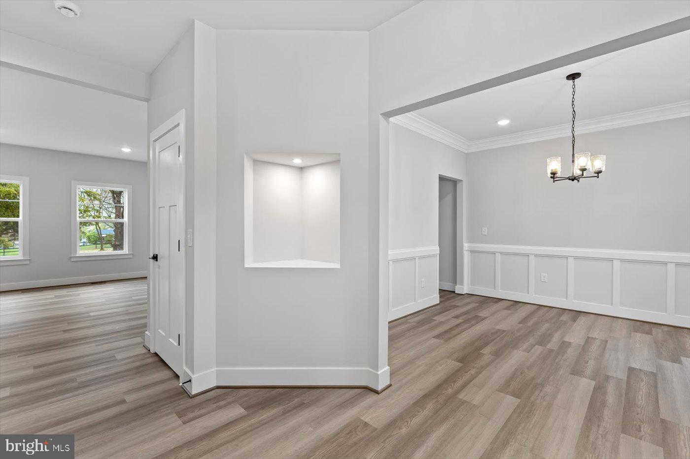 0 Stevensburg Road Culpeper, VA 22701 - Photo 10 of 42 an empty room with wooden floor chandelier and windows