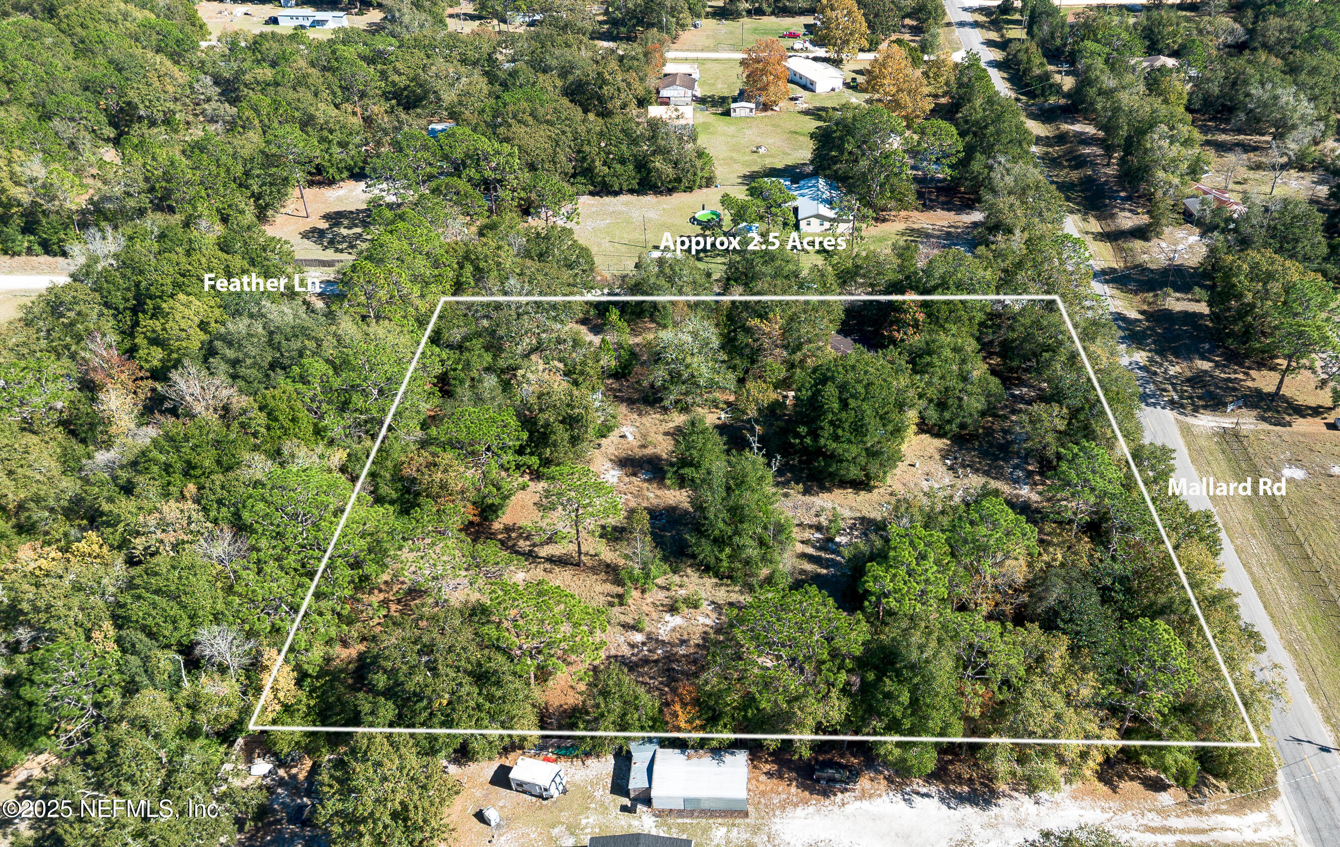 2130 Mallard Road Middleburg, FL 32068 - Photo 16 of 21 an aerial view of a house with a yard