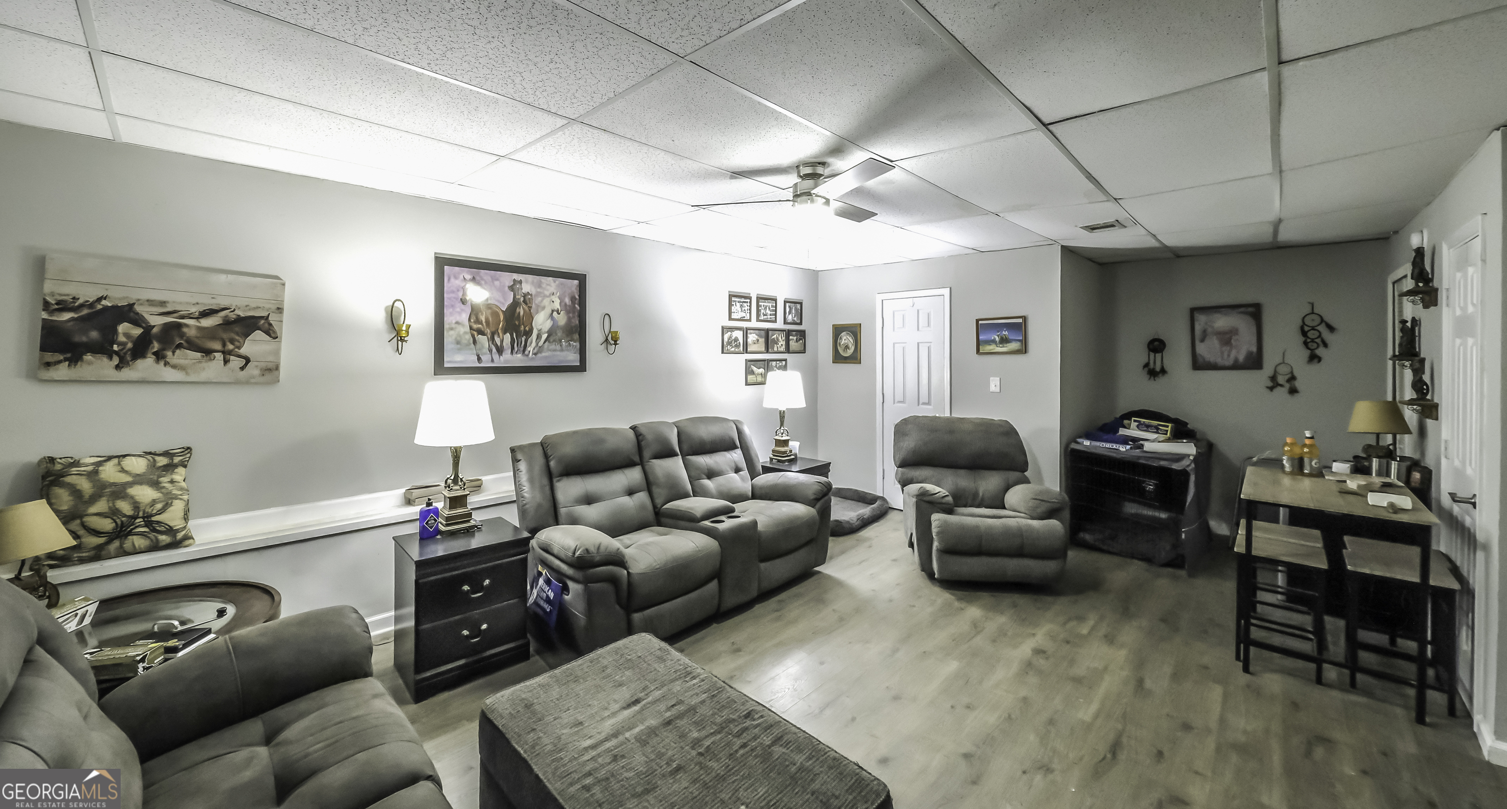 85 Taylors Gin Road Temple, GA 30179 - Photo 15 of 45 a living room with furniture and wooden floor