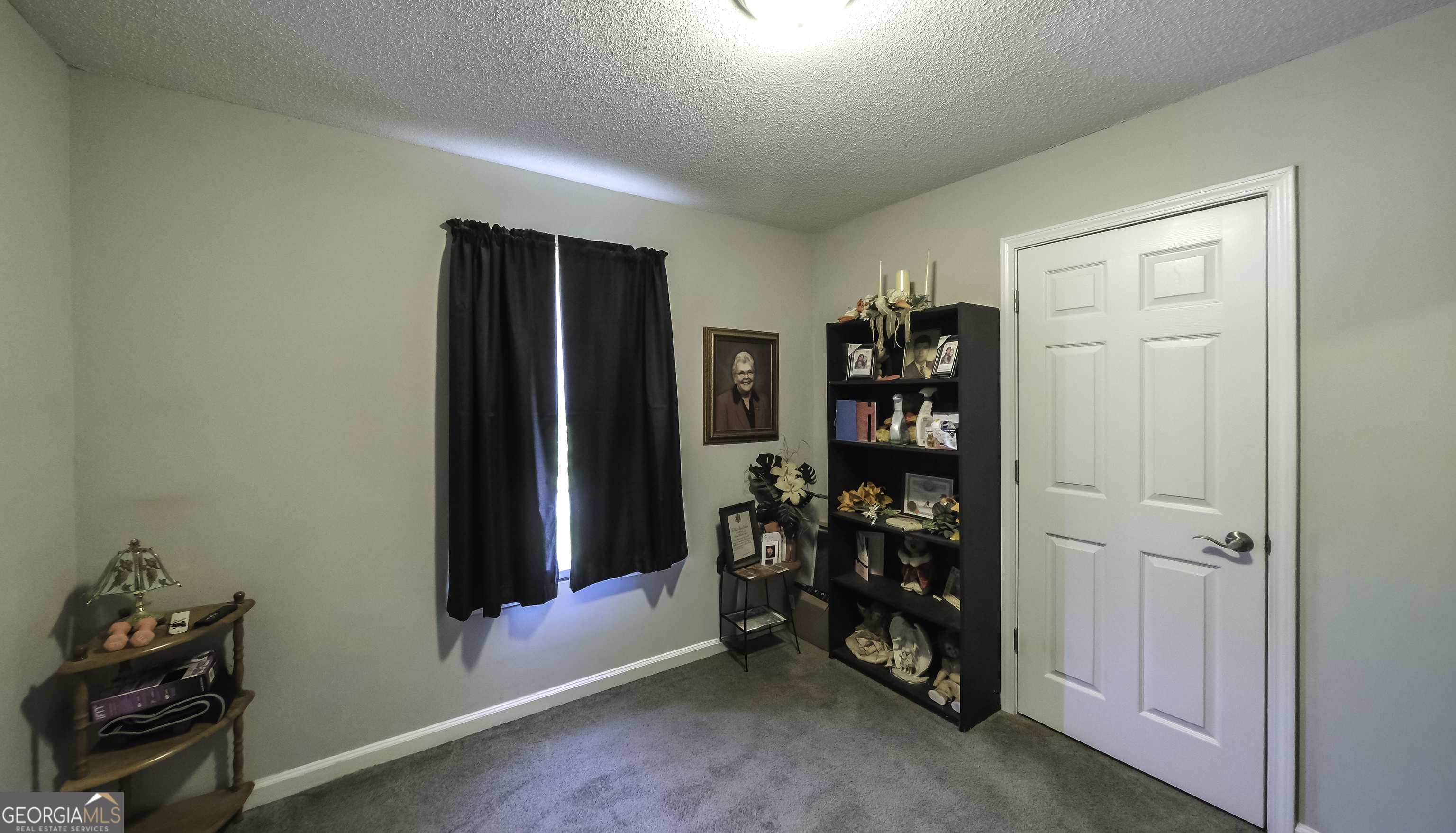 85 Taylors Gin Road Temple, GA 30179 - Photo 25 of 45 a view of a room with shelves