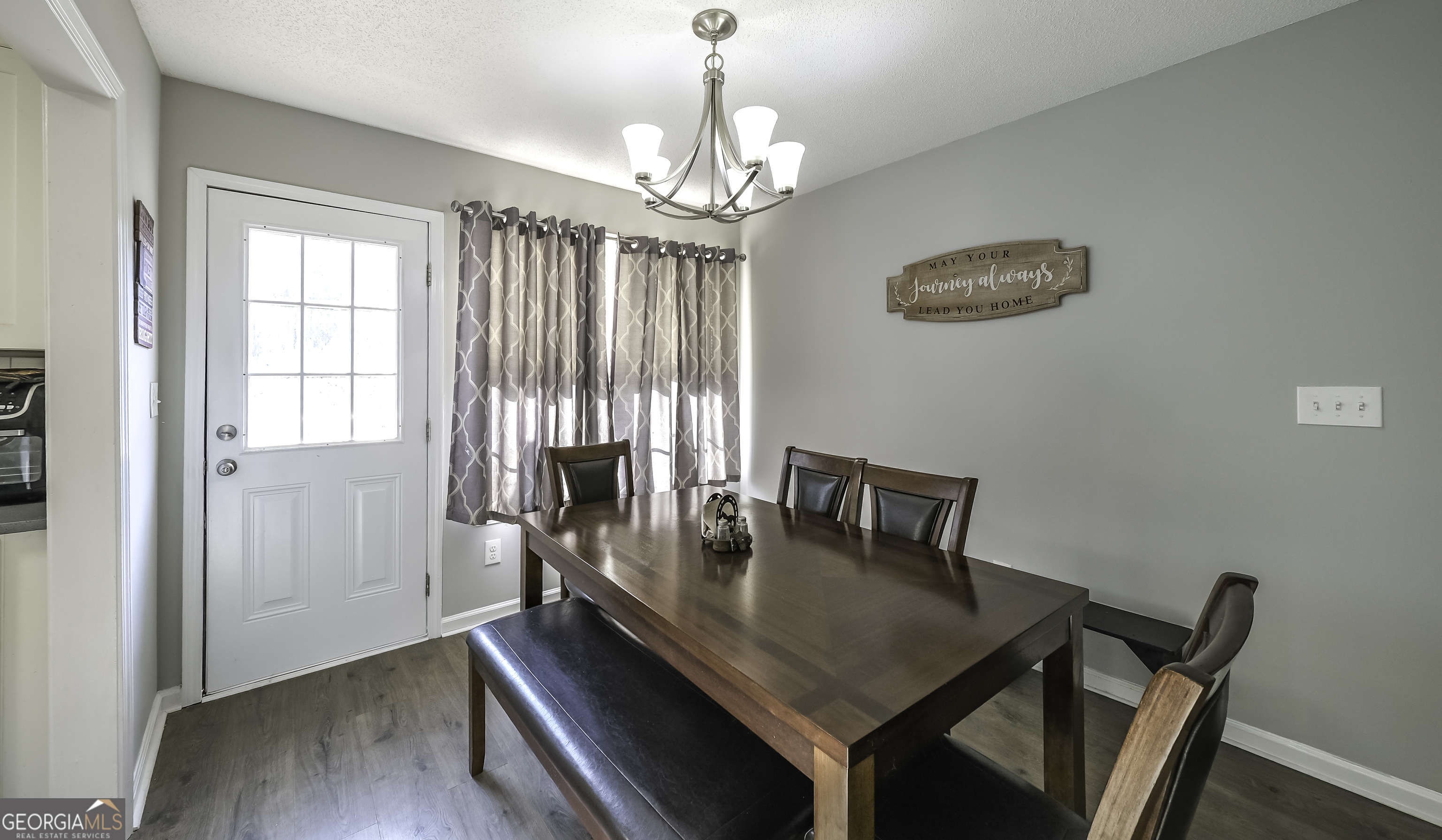 85 Taylors Gin Road Temple, GA 30179 - Photo 28 of 45 a view of a dining room with furniture window and wooden floor