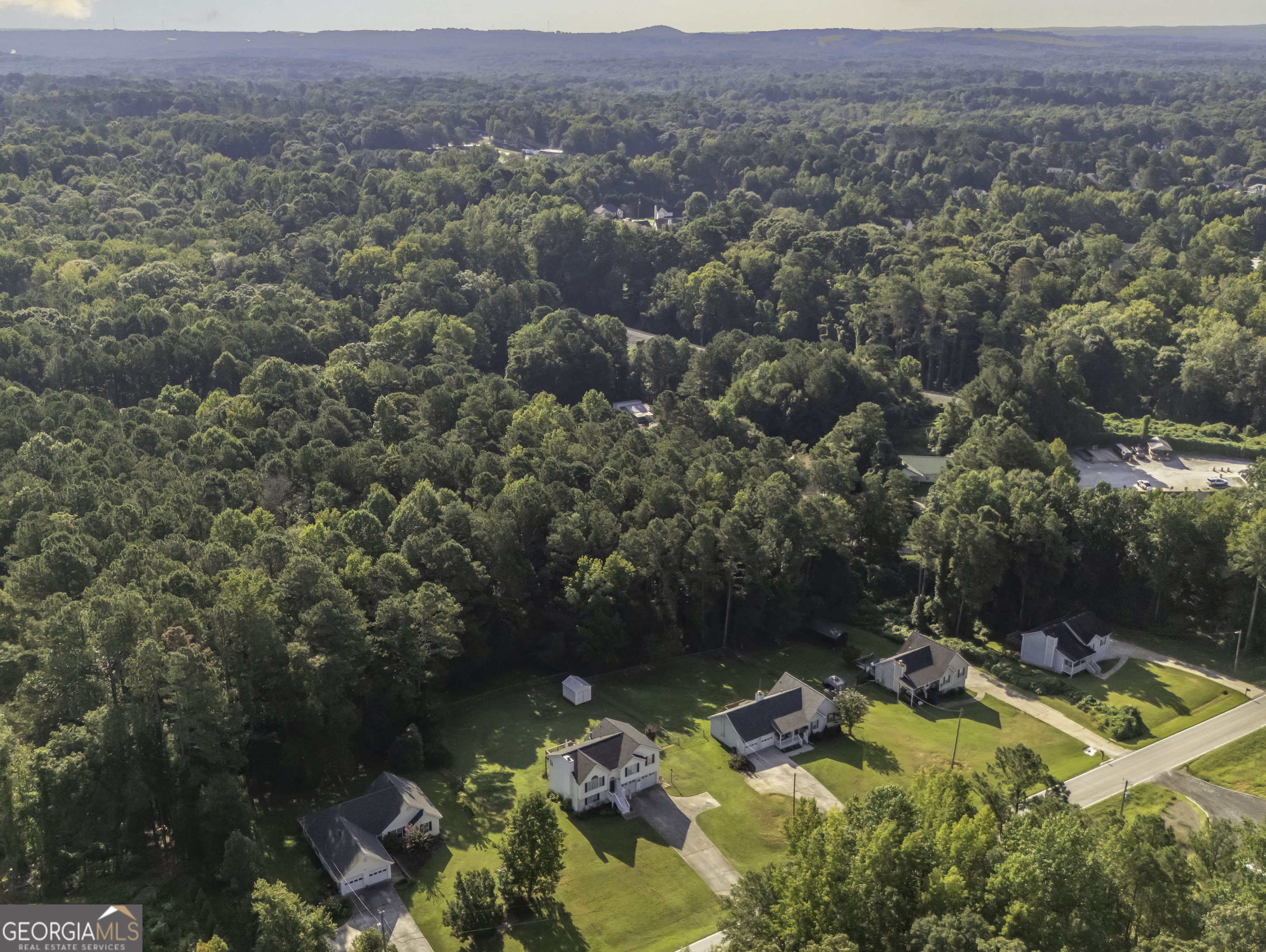 85 Taylors Gin Road Temple, GA 30179 - Photo 34 of 45 an aerial view of a house with a yard