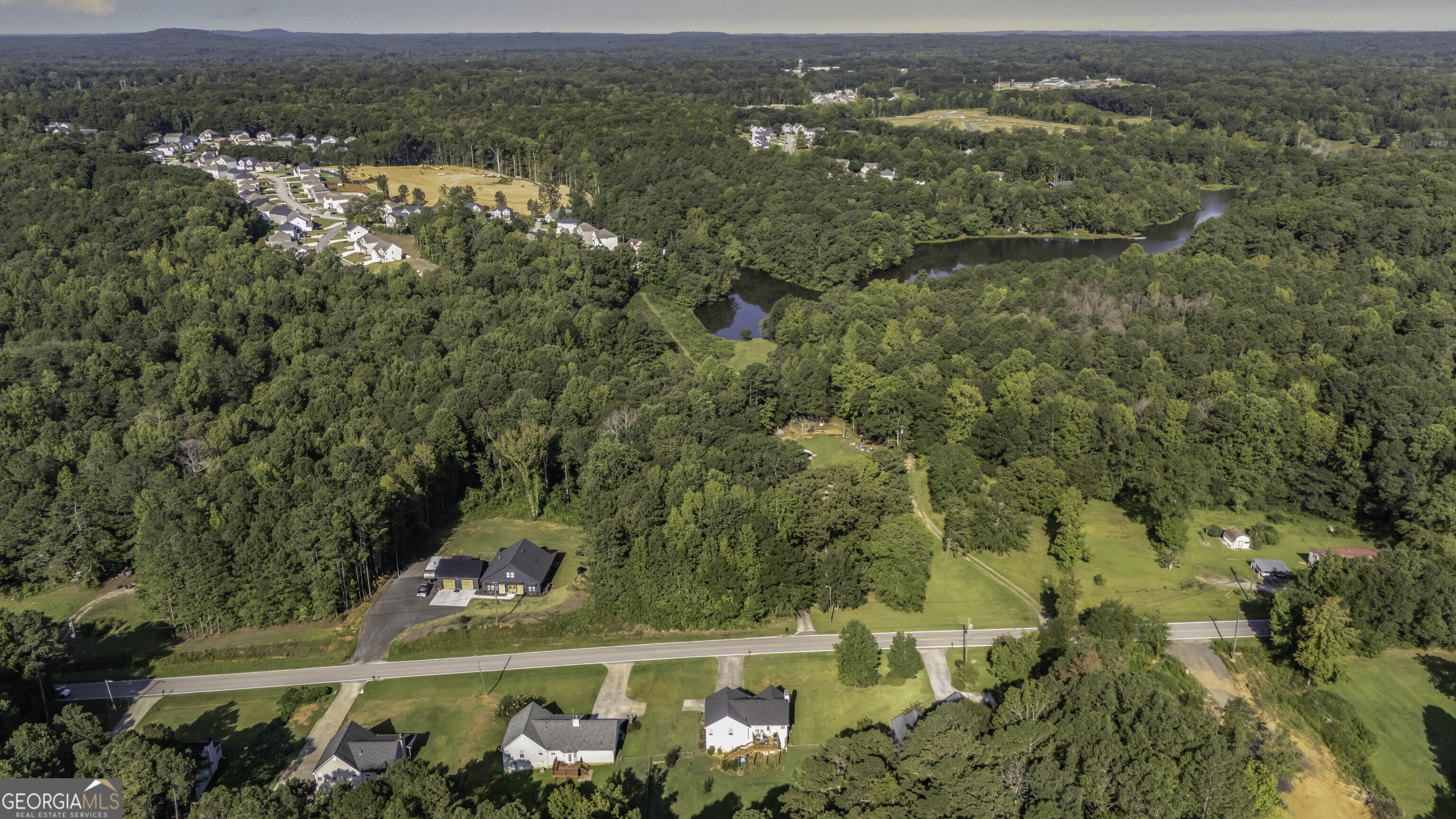 85 Taylors Gin Road Temple, GA 30179 - Photo 37 of 45 an aerial view of a city with lots of residential buildings