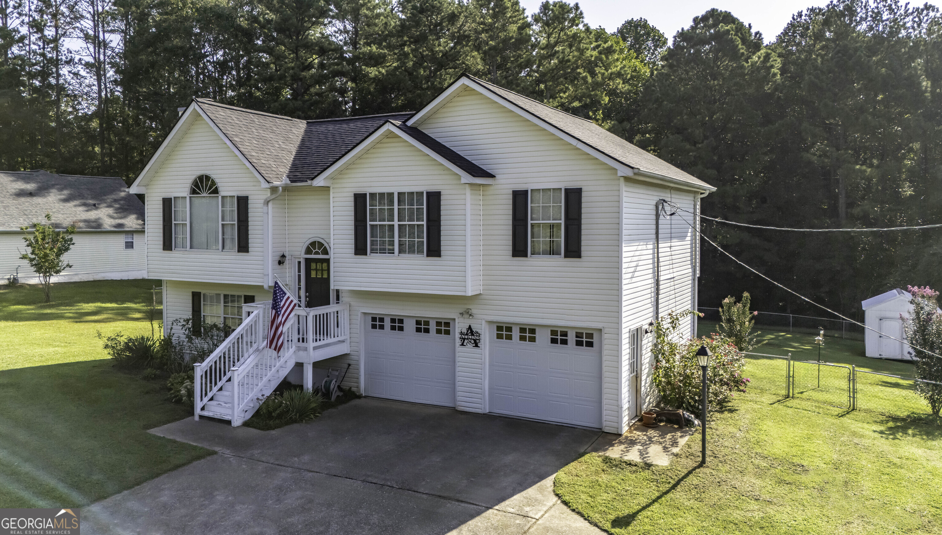 85 Taylors Gin Road Temple, GA 30179 - Photo 40 of 45 a view of a house with swimming pool