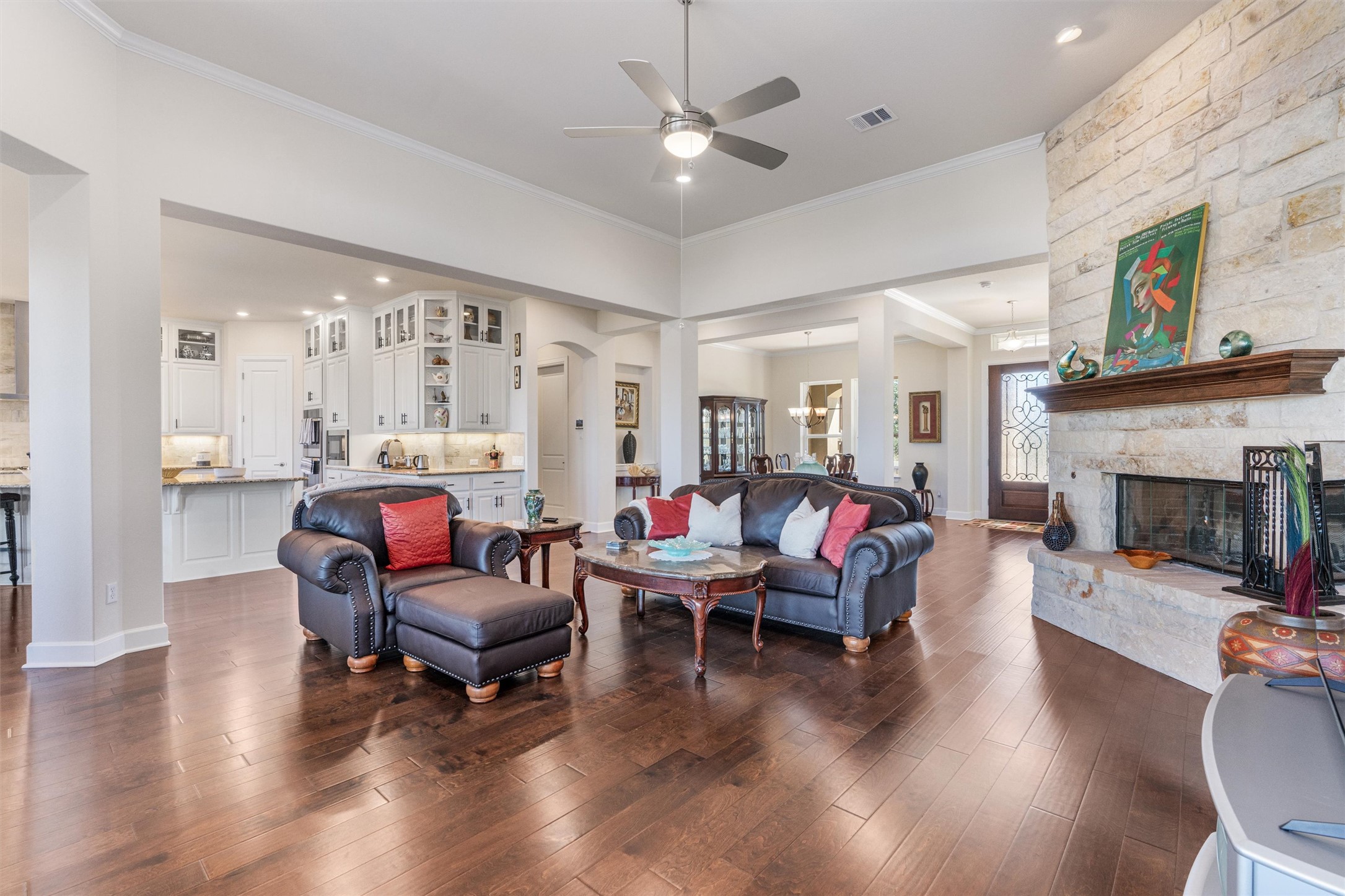 235 Chestnut Crossing Burnet, TX 78611 - Photo 15 of 39 a living room with furniture and a fireplace