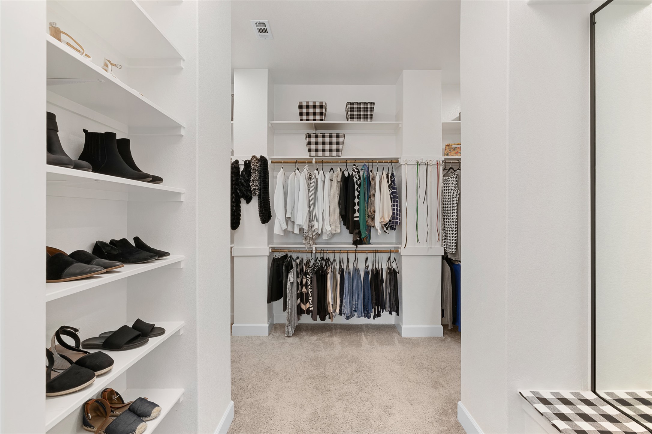 235 Chestnut Crossing Burnet, TX 78611 - Photo 24 of 39 a view of walk in closet with clothes and shoes
