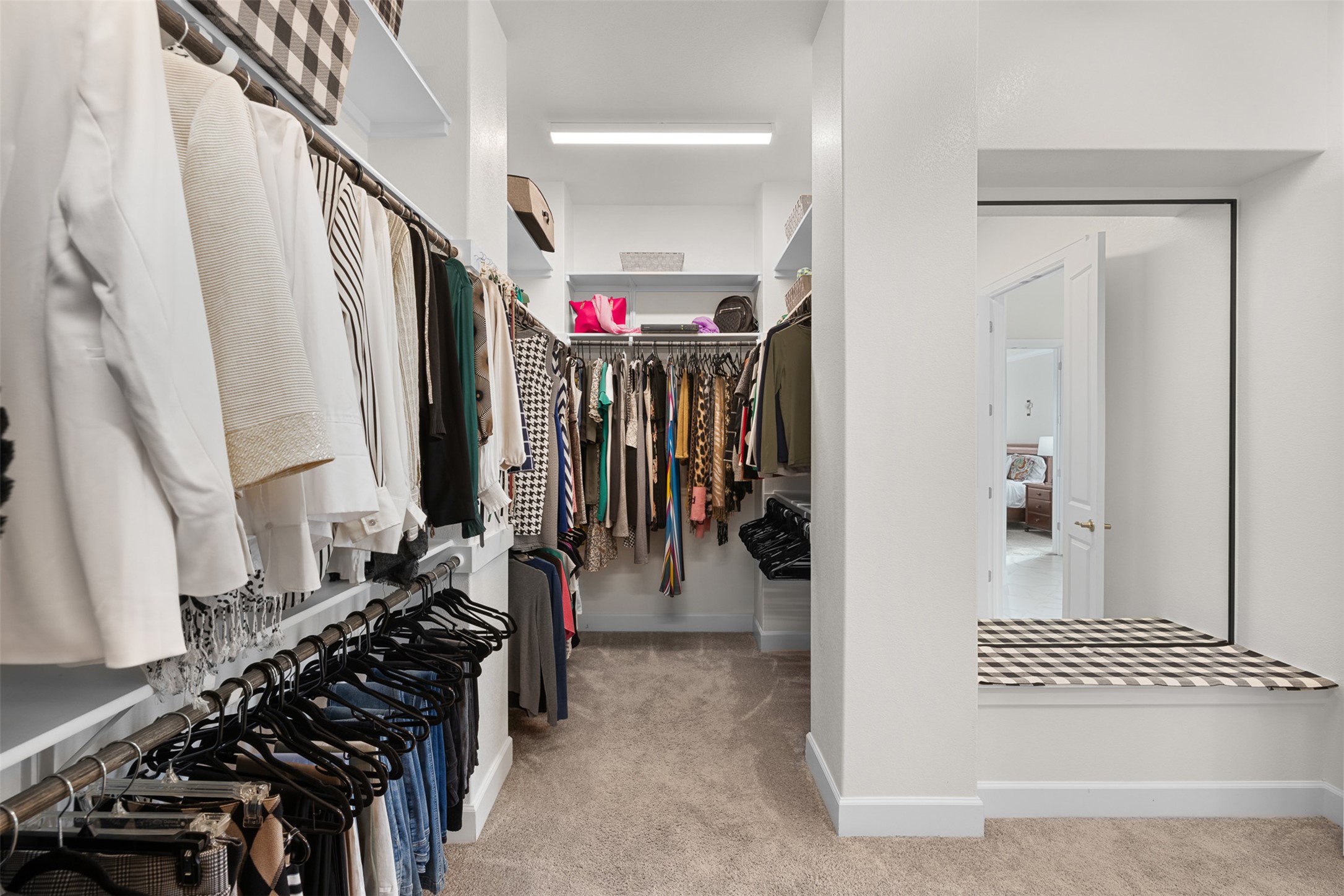 235 Chestnut Crossing Burnet, TX 78611 - Photo 25 of 39 a view of a hallway with wooden floor and windows