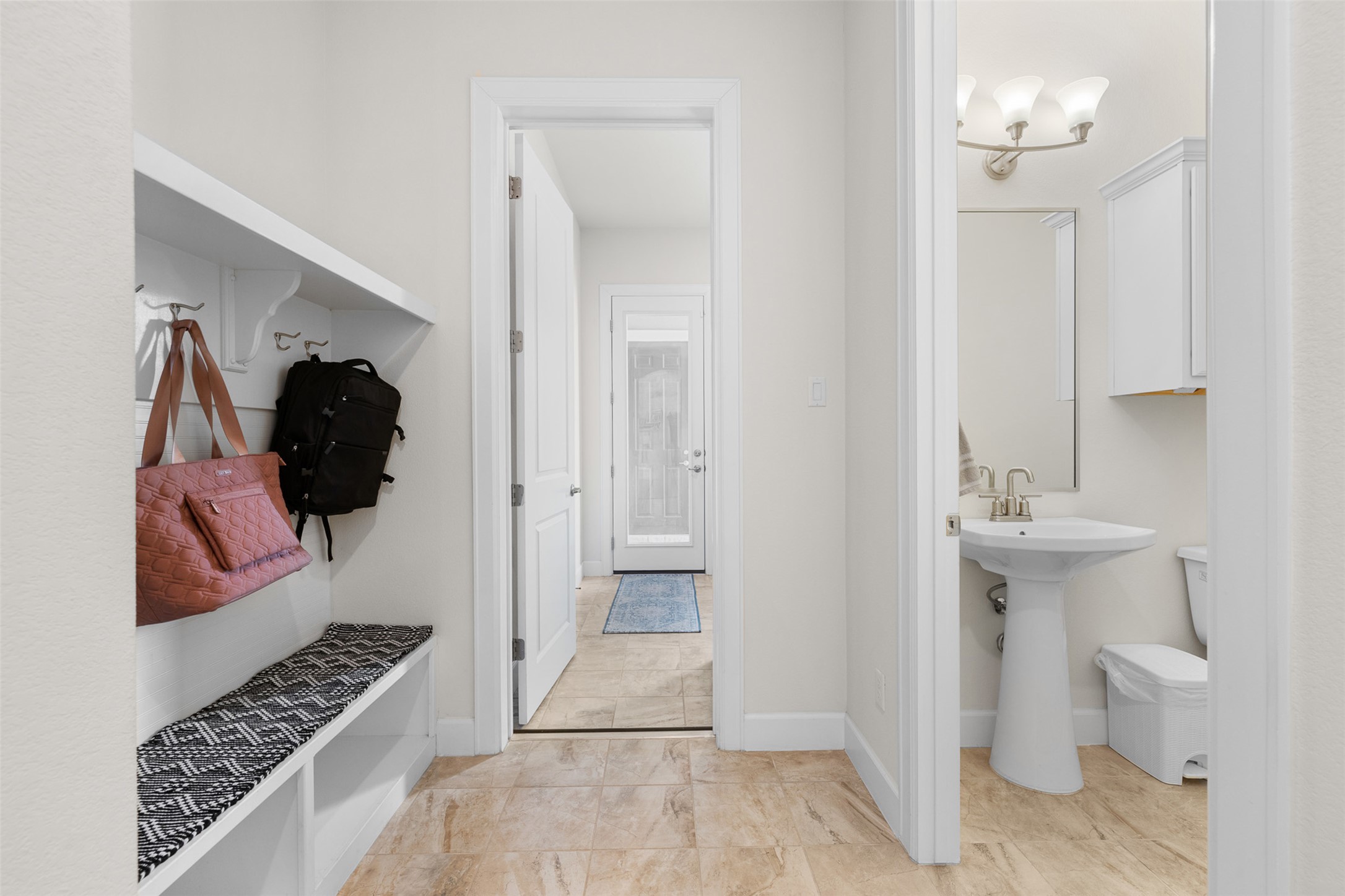 235 Chestnut Crossing Burnet, TX 78611 - Photo 27 of 39 a view of bathroom with a sink toilet and a mirror