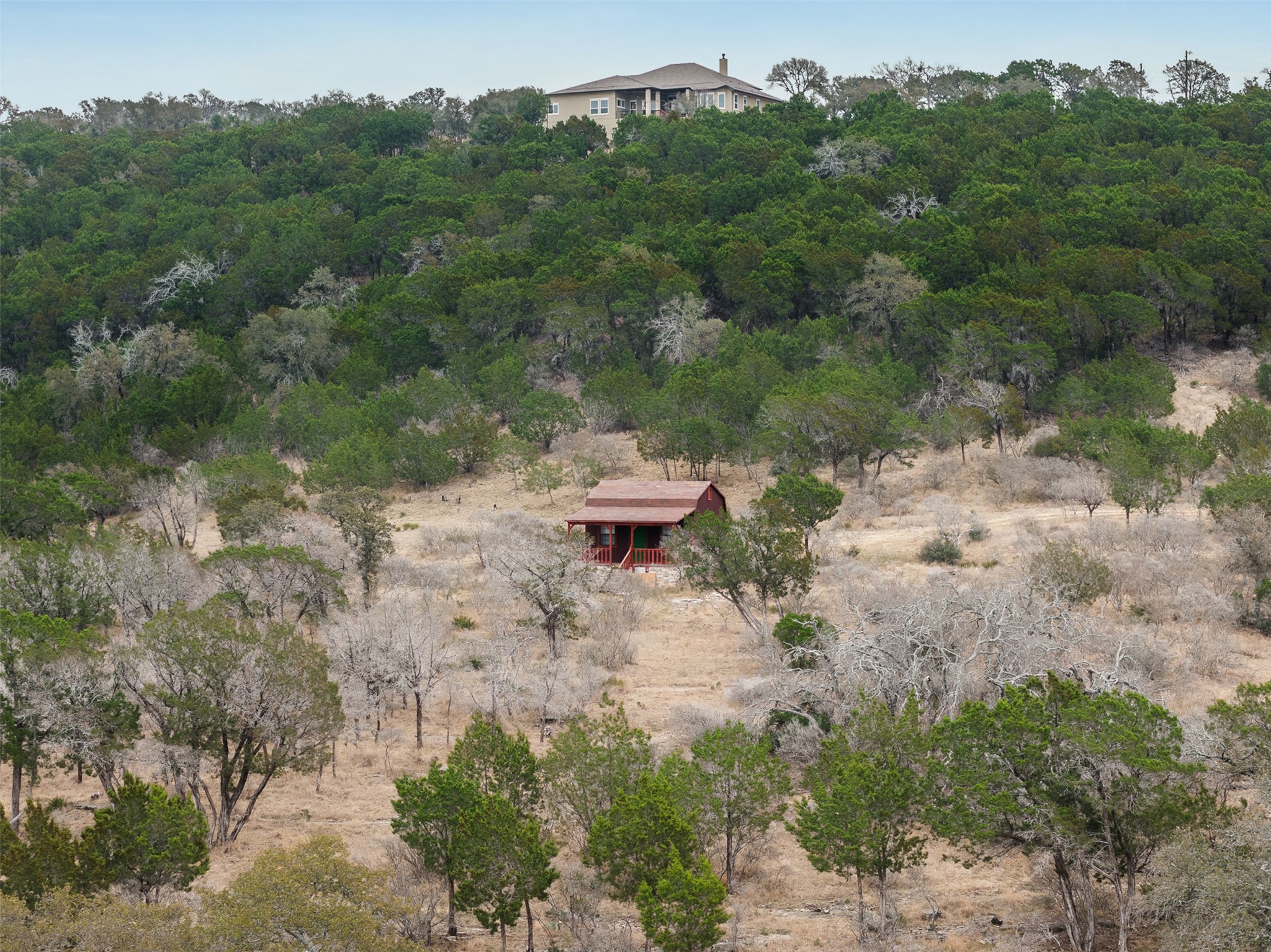 235 Chestnut Crossing Burnet, TX 78611 - Photo 29 of 39 a backyard of a house with a yard and outdoor seating