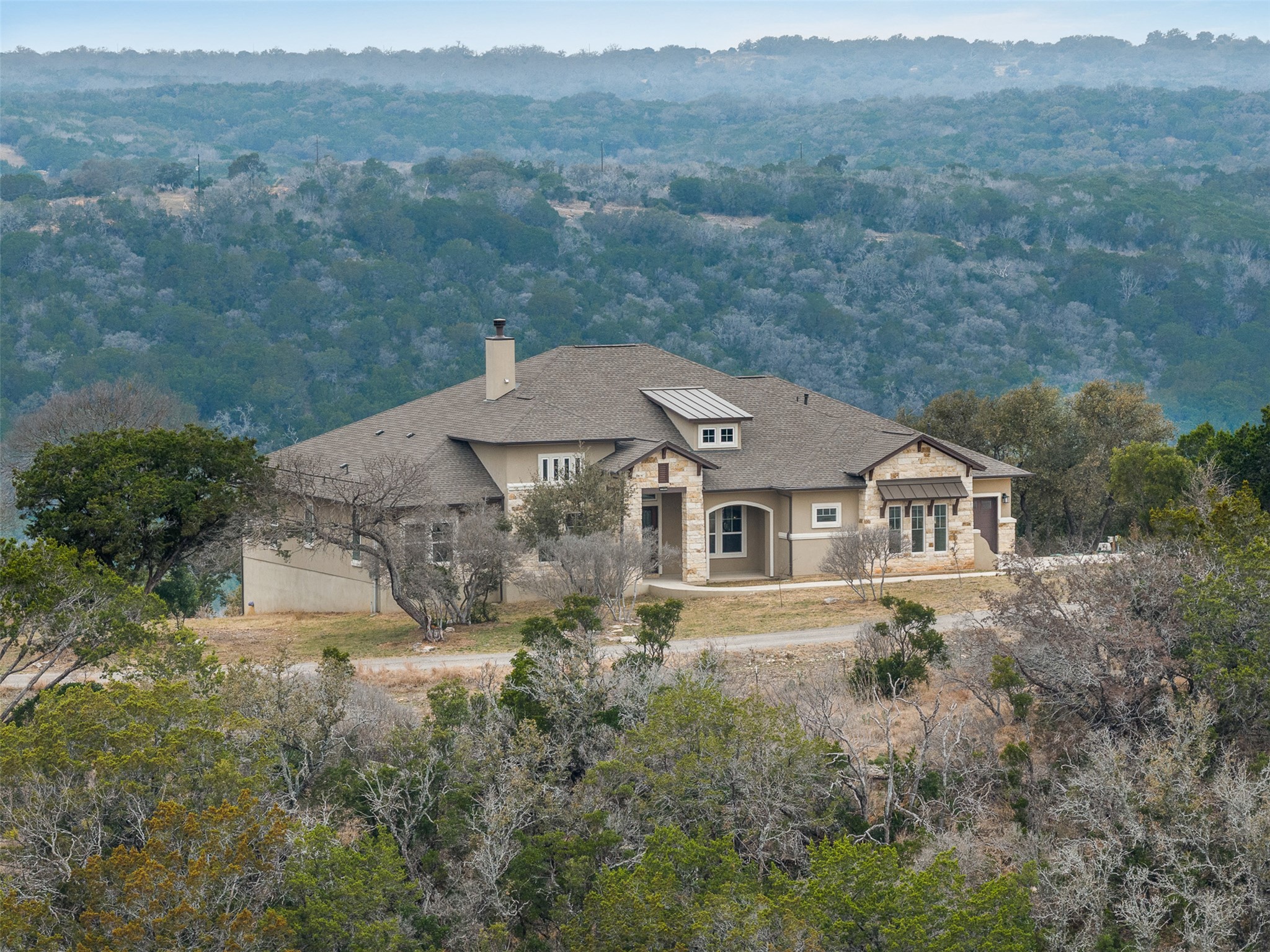 235 Chestnut Crossing Burnet, TX 78611 - Photo 30 of 39 an aerial view of a house