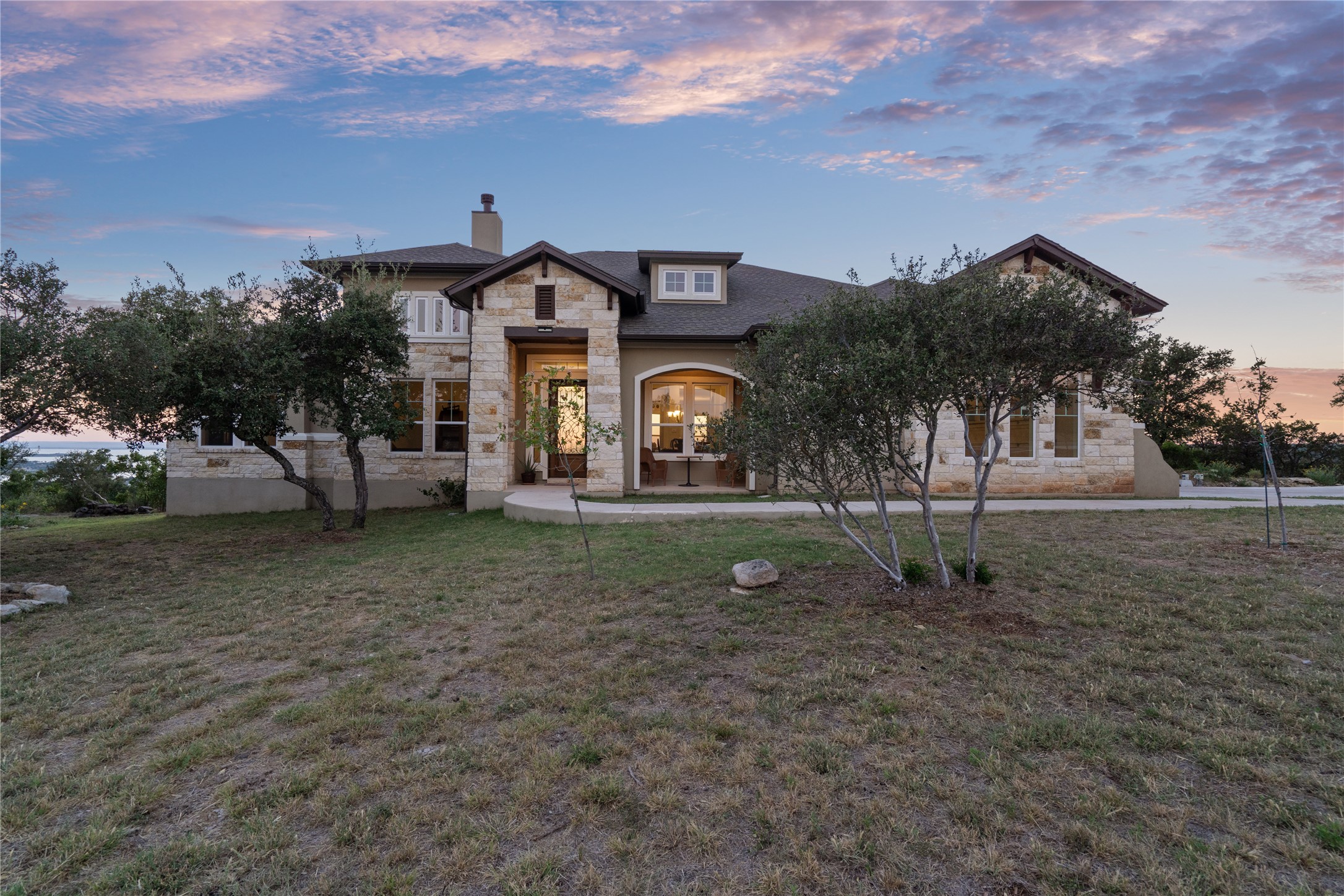 235 Chestnut Crossing Burnet, TX 78611 - Photo 3 of 39 a house view with a outdoor space